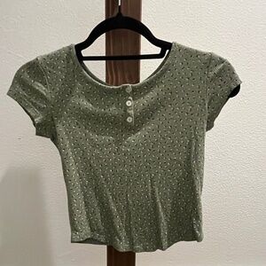 Green shirt with flowers